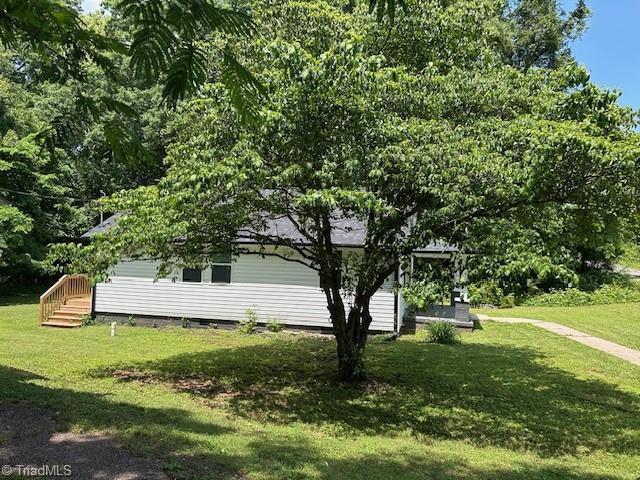 545 S Fieldcrest Rd, Eden, NC 27288 - view of home's exterior with a yard