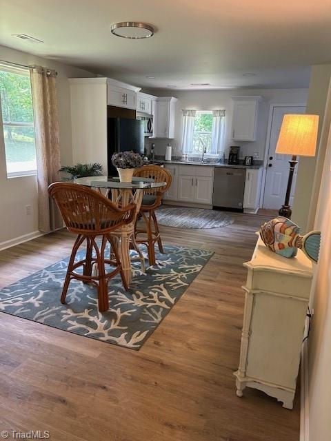 545 S Fieldcrest Rd, Eden, NC 27288 - dining area featuring wood finished floors and baseboards