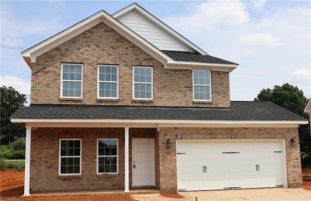 125 Glasmere Ct, Winston-Salem, NC 27101 - view of front of property with brick siding, driveway, and a garage