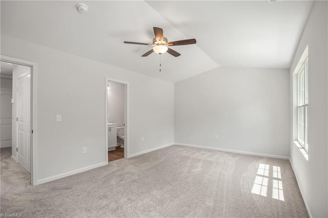 125 Glasmere Ct, Winston-Salem, NC 27101 - unfurnished bedroom featuring a spacious closet, carpet flooring, lofted ceiling, baseboards, and a closet
