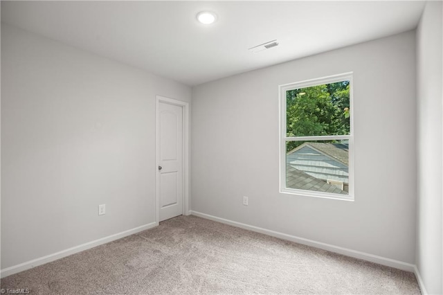 125 Glasmere Ct, Winston-Salem, NC 27101 - unfurnished room featuring light colored carpet, baseboards, and recessed lighting