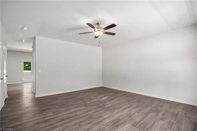 125 Glasmere Ct, Winston-Salem, NC 27101 - empty room featuring a ceiling fan, dark wood-style floors, and baseboards