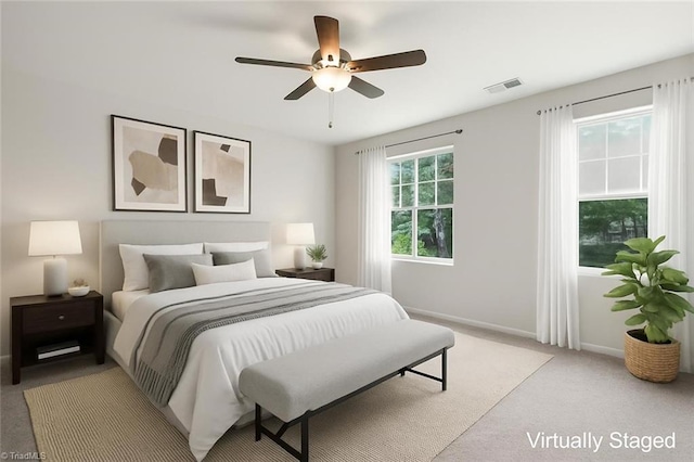 125 Glasmere Ct, Winston-Salem, NC 27101 - bedroom featuring baseboards, light carpet, and ceiling fan