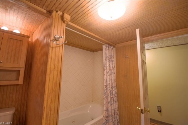 bathroom with shower / bath combo with shower curtain, toilet, and wooden ceiling