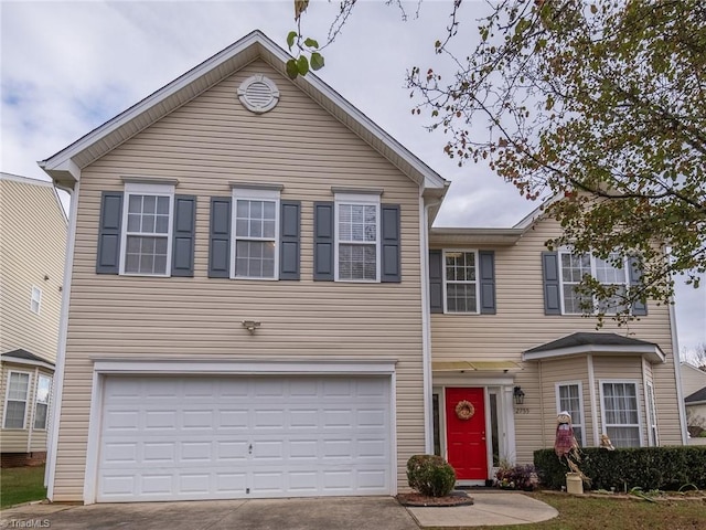 2755 Amesbury Rd, Winston-Salem, NC 27103 - view of front facade with a garage and driveway