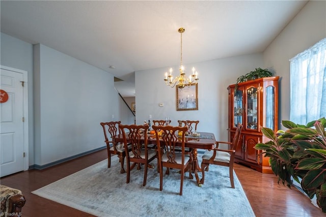 2755 Amesbury Rd, Winston-Salem, NC 27103 - dining room featuring a chandelier and wood finished floors
