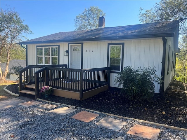 view of front of property featuring a wooden deck