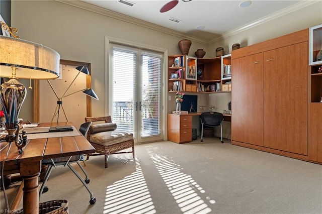 carpeted office featuring ceiling fan and ornamental molding