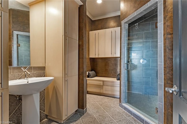 bathroom featuring walk in shower, tasteful backsplash, tile patterned floors, and crown molding