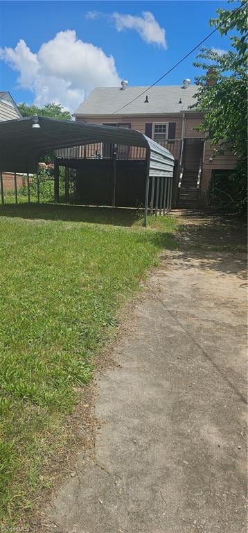 508 Twin Oak Ct, High Point, NC 27260 - view of green lawn featuring a carport