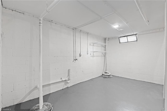 below grade area with concrete block wall