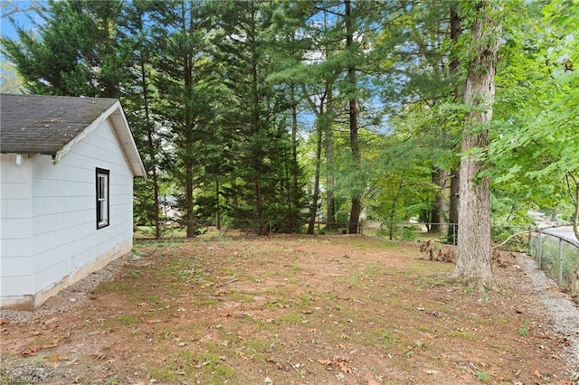 view of yard featuring fence