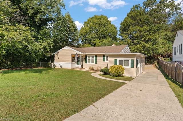 view of front of house with a front lawn