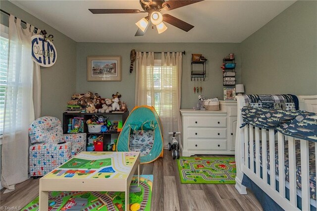 1055 Old Silver Hill Rd, Lexington, NC 27292 - bedroom featuring wood finished floors and ceiling fan