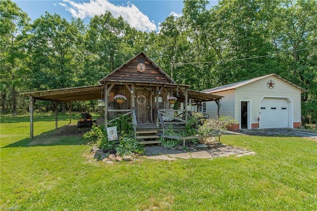 1055 Old Silver Hill Rd, Lexington, NC 27292 - view of front facade with a detached garage, a front yard, an outdoor structure, and driveway