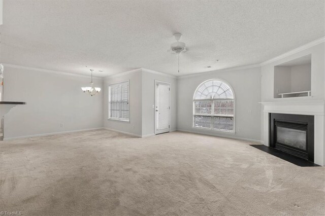 unfurnished living room featuring a textured ceiling, crown molding, light colored carpet, and ceiling fan with notable chandelier