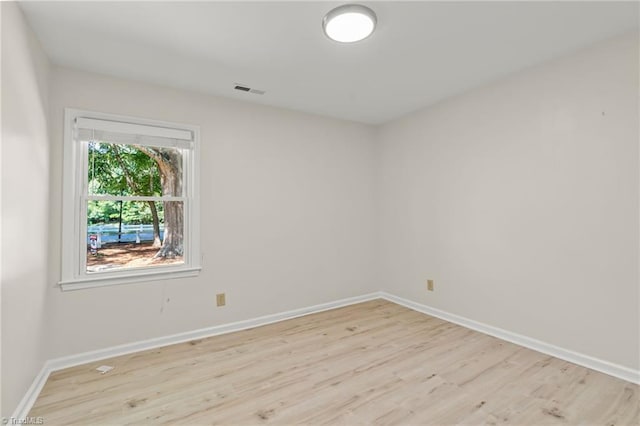 800 Carriage Crossing Ln Unit E, Greensboro, NC 27410 - spare room with wood finished floors