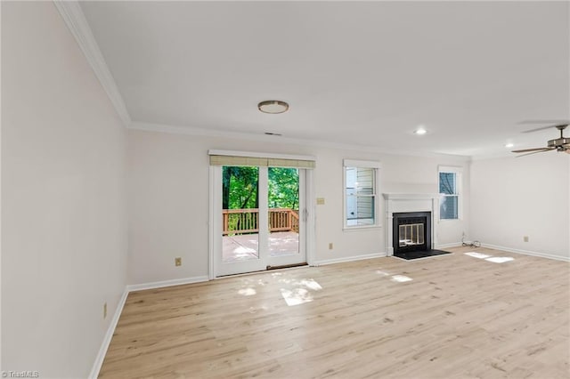 800 Carriage Crossing Ln Unit E, Greensboro, NC 27410 - unfurnished living room with crown molding, light wood-style floors, ceiling fan, a fireplace with flush hearth, and recessed lighting