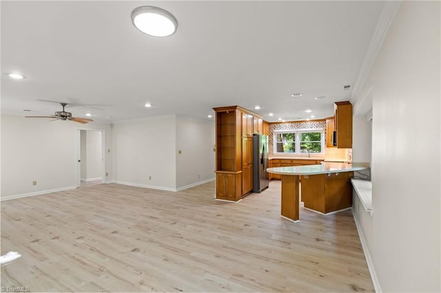 800 Carriage Crossing Ln Unit E, Greensboro, NC 27410 - kitchen with recessed lighting, stainless steel refrigerator with ice dispenser, ornamental molding, brown cabinets, and open floor plan