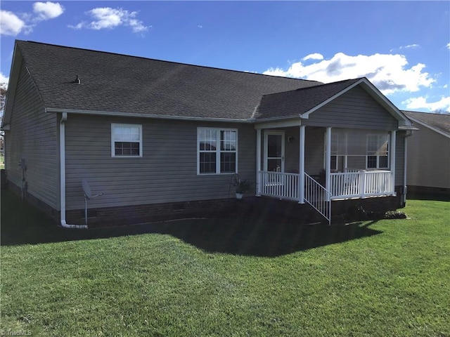 view of front of property with a porch, crawl space, a shingled roof, and a front lawn