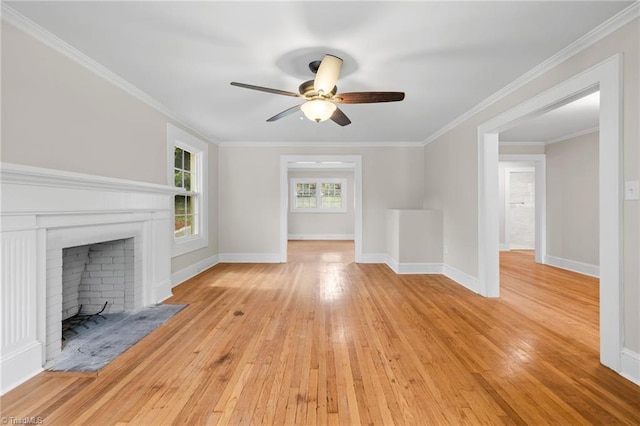 unfurnished living room with crown molding, ceiling fan, and light wood-type flooring