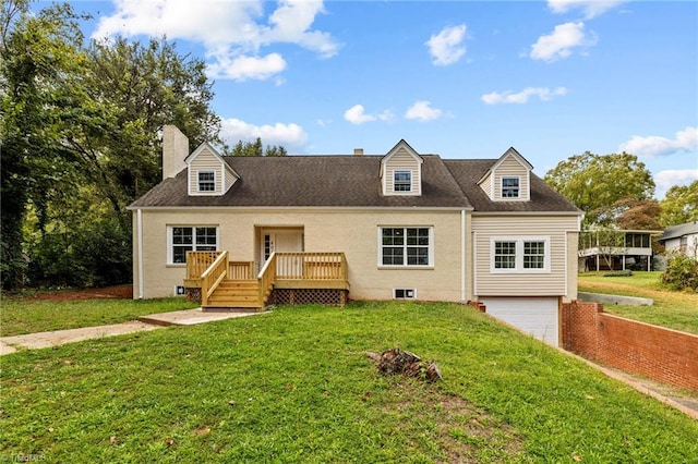 cape cod-style house featuring a front yard and a garage