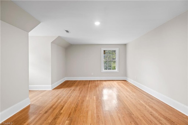 unfurnished room featuring light hardwood / wood-style floors