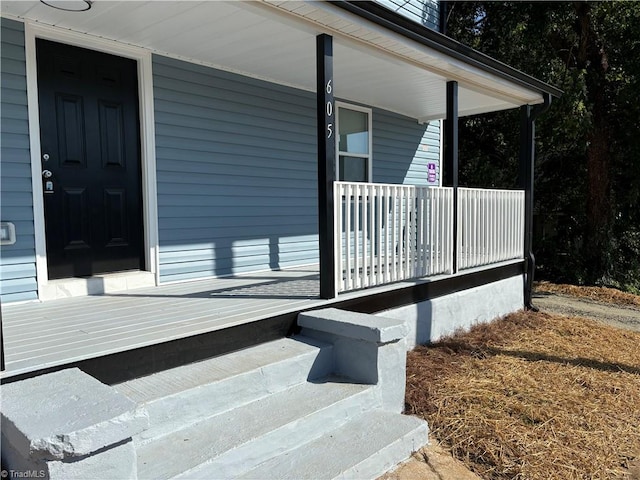 deck featuring covered porch