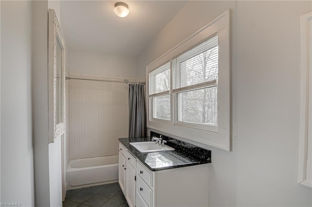 full bath with shower / bath combination with curtain, vanity, and tile patterned flooring