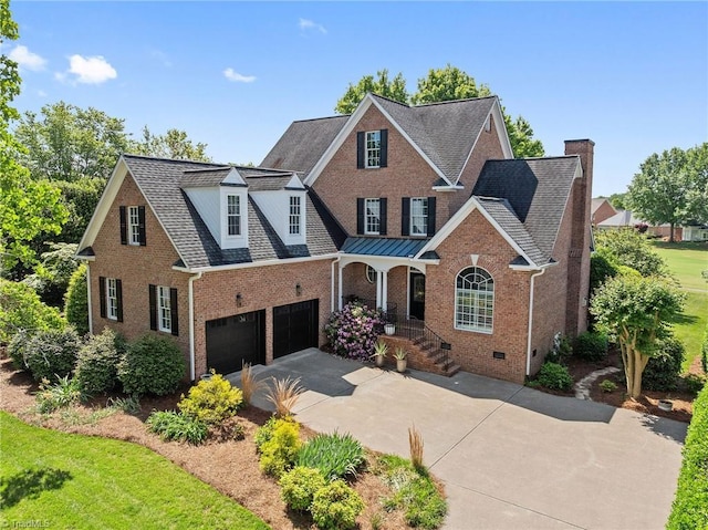 view of front of home featuring brick siding, concrete driveway, a chimney, and crawl space