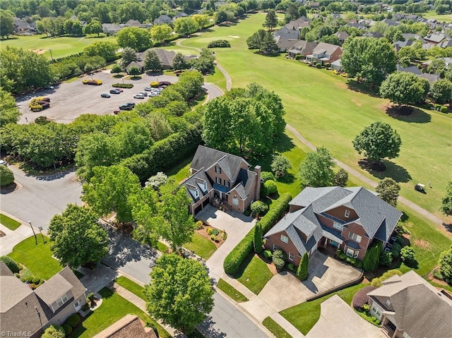 aerial perspective of suburban area featuring a golf club