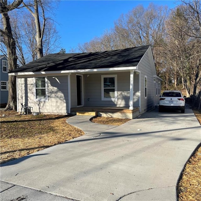 ranch-style home with covered porch