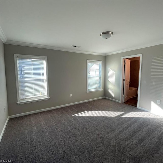 carpeted spare room with ornamental molding