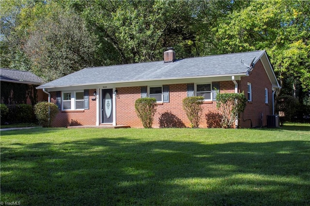 single story home featuring a front yard and central AC unit