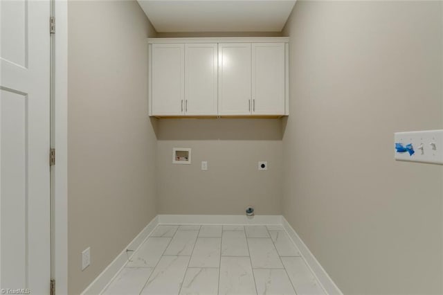 washroom with cabinets, electric dryer hookup, and washer hookup