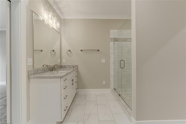 bathroom with crown molding, vanity, and walk in shower