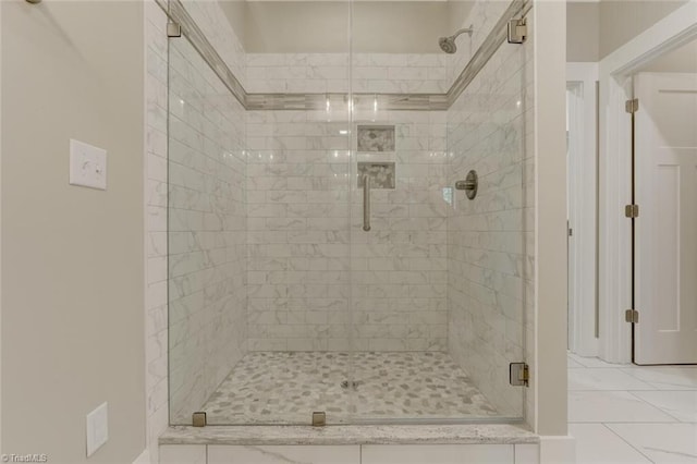 bathroom with an enclosed shower