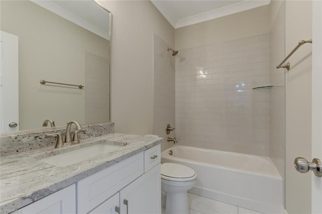 full bathroom featuring tiled shower / bath, vanity, and toilet