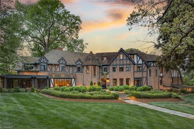 view of front of house with a lawn