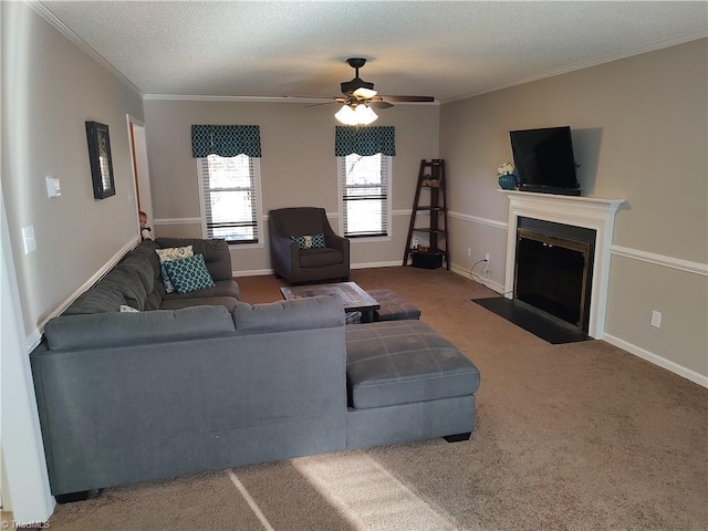 3210 Clamoor Dr, Winston-Salem, NC 27127 - carpeted living room with crown molding, ceiling fan, a fireplace with flush hearth, and a textured ceiling