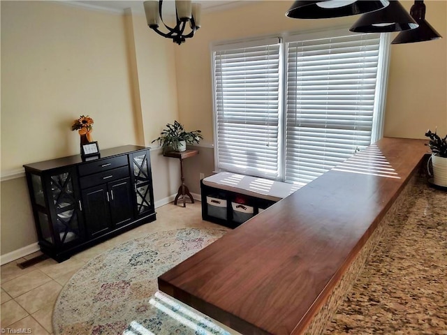 3210 Clamoor Dr, Winston-Salem, NC 27127 - tiled home office featuring a chandelier and ornamental molding