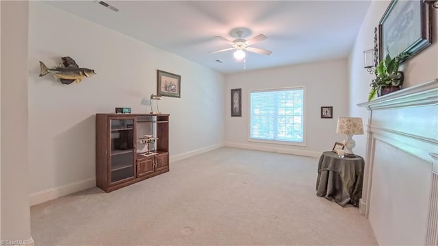 1250 Whitworth Ct, Kernersville, NC 27284 - sitting room with light colored carpet and a ceiling fan