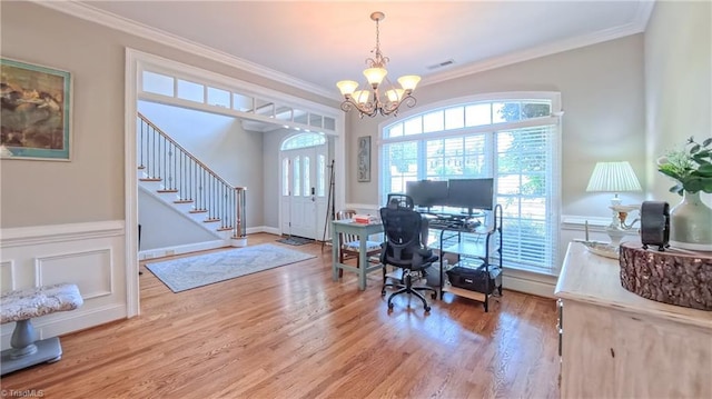 1250 Whitworth Ct, Kernersville, NC 27284 - home office featuring a chandelier, wood finished floors, crown molding, and a wainscoted wall