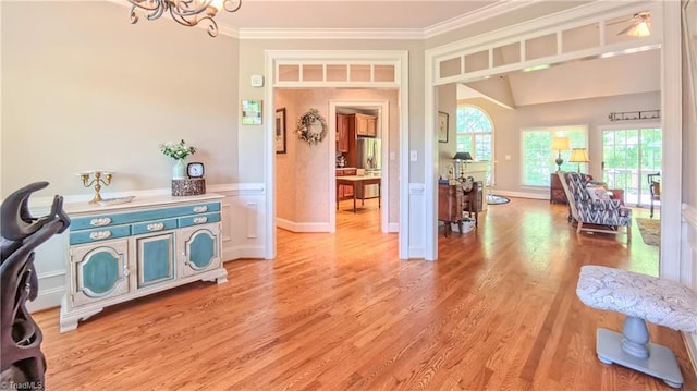 1250 Whitworth Ct, Kernersville, NC 27284 - interior space with crown molding, light wood-style flooring, and a chandelier