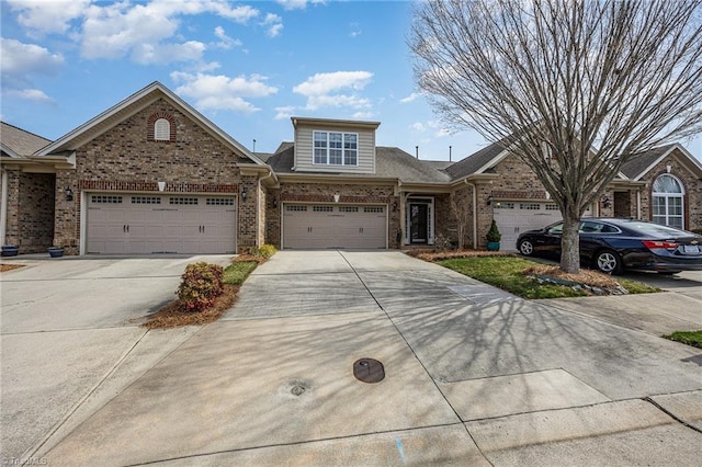 view of front facade with brick siding, concrete driveway, a garage, and roof with shingles