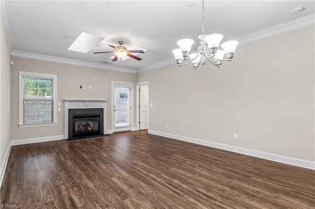 5707 Washburn Ln, Colfax, NC 27235 - unfurnished living room with dark wood-style floors, baseboards, a ceiling fan, crown molding, and a chandelier