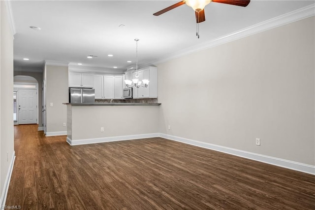 5707 Washburn Ln, Colfax, NC 27235 - unfurnished living room with a ceiling fan, ornamental molding, dark wood finished floors, baseboards, and recessed lighting