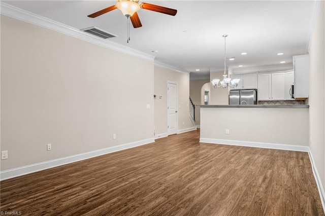 5707 Washburn Ln, Colfax, NC 27235 - unfurnished living room with crown molding, dark wood-style flooring, a ceiling fan, baseboards, and recessed lighting