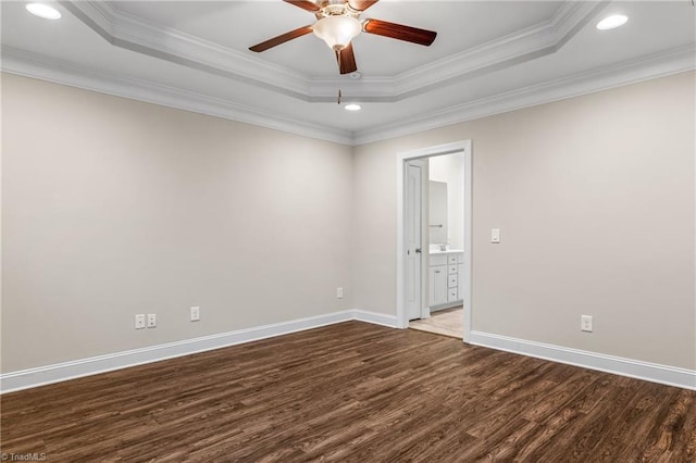 5707 Washburn Ln, Colfax, NC 27235 - empty room featuring a raised ceiling, wood finished floors, ceiling fan, recessed lighting, and ornamental molding