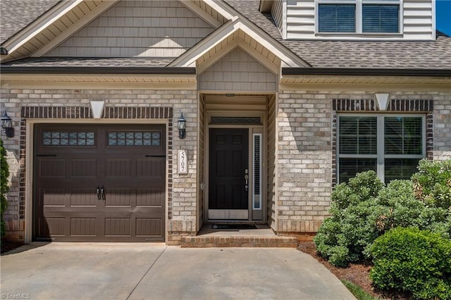 5707 Washburn Ln, Colfax, NC 27235 - property entrance with roof with shingles, driveway, and an attached garage